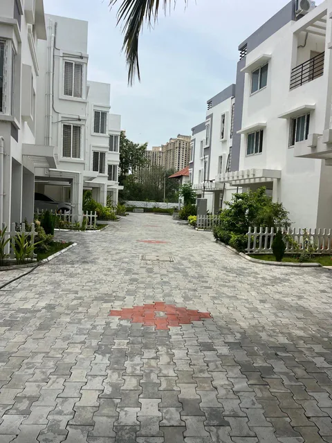 The landscaped internal lane through the Uyara-developed gated community